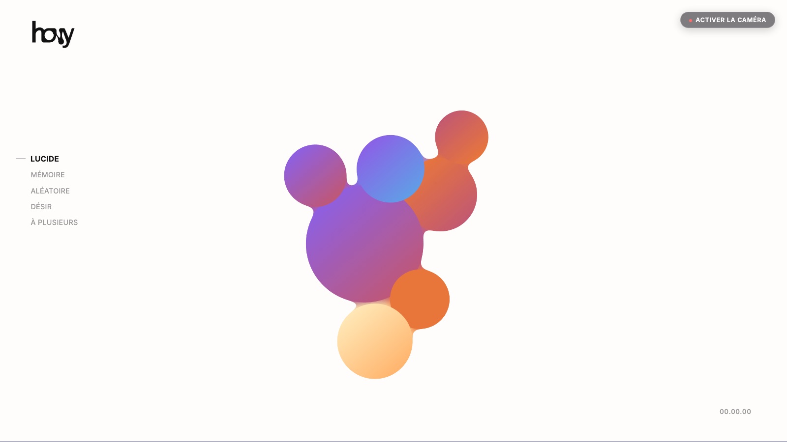 Écran d’accueil du prototype : des boules colorées fusionnées en metaball, et la liste des modes Lucide, Mémoire, Aléatoire, Désir, À plusieurs